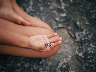 Hands of a person in a meditative mudra position